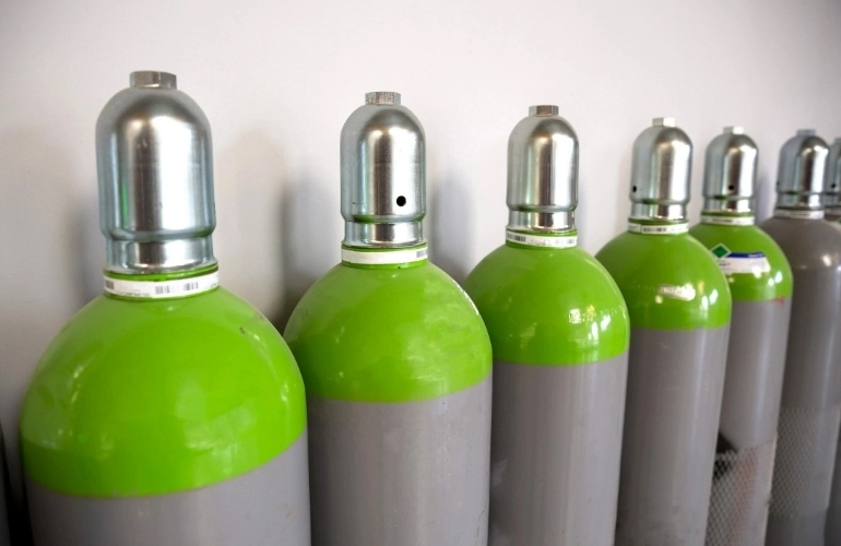 zielone butle z gazem